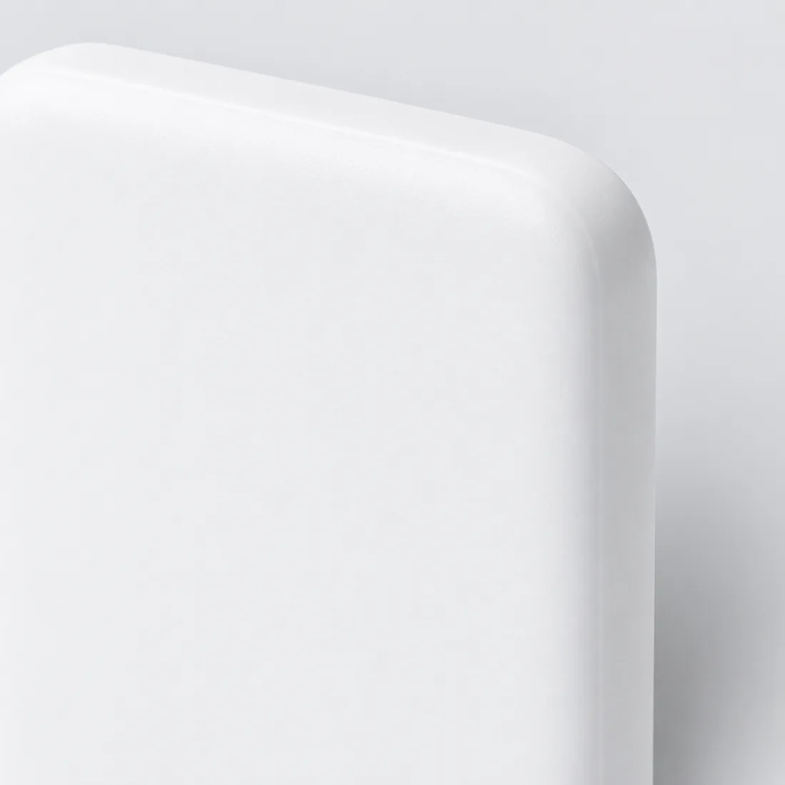 Power bank MagSafe 1ª linha branco na caixa — detalhe